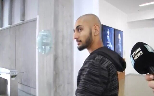 Screen capture from video of Amir Abu Laben, suspected of killing an 8-year-old boy in a traffic accident on Yom Kippur, seen in a Tel Aviv court. (Walla News) Screen capture from video of Amir Abu Laben, suspected of killing an 8-year-old boy in a traffic accident on Yom Kippur, seen in a Tel Aviv court. (Walla News)