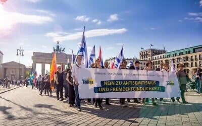 Leaders march with a banner saying 'No to anti-Semitism' in the Berlin March of Life. (Courtesy)