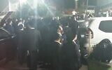 Blue and White leader Benny Gantz is booed as he enters the wedding of ultra-Orthodox MK Yaakov Asher's son, November 10, 2019 (Screen grab via Kan)