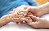 Illustrative image of holding hands (Pablo_K; iStock by Getty Images)