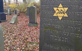 A Yello star sticker on a Jewish grave in Denmark on Nov. 10, 2019. (Courtesy of Rabbi Yitzi Loewenthal via JTA)