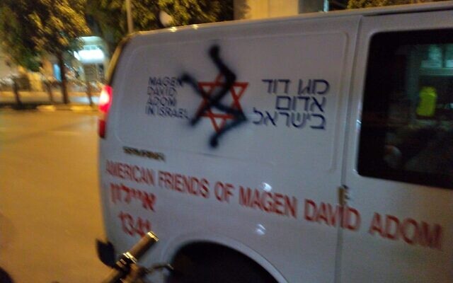 A swastika painted on a Magen David Adom ambulance in Tel Aviv on November 15, 2019. (courtesy MDA) A swastika painted on a Magen David Adom ambulance in Tel Aviv on November 15, 2019. (courtesy MDA)