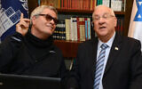 Shlomo Artzi, left, and Israeli President Reuven Rivlin sing together, April 13, 2015. (Courtesy of the Spokesperson of the President of Israel via JTA)
