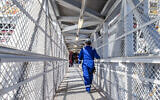 A worker walking on the Leviathan natural gas platform, offshore of Israel. (Albatross)