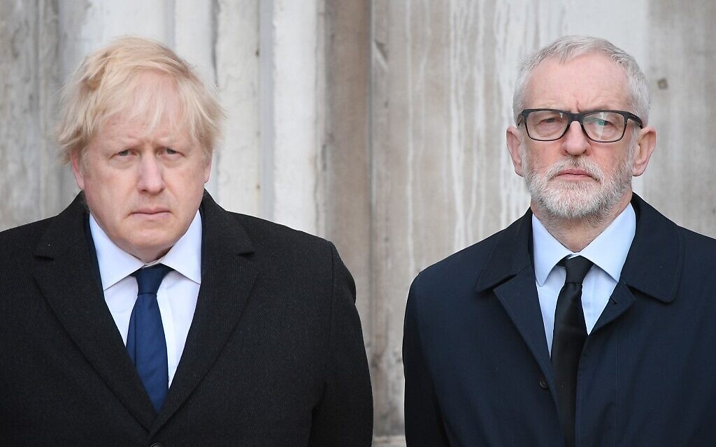Britain's Prime Minister Boris Johnson (L) and opposition Labour party leader Jeremy Corbyn take part in a vigil at the Guildhall in central London to pay tribute to the victims of the London Bridge terror attack on December 2, 2019. (Daniel Leal-Olivas/AFP) Britain's Prime Minister Boris Johnson (L) and opposition Labour party leader Jeremy Corbyn take part in a vigil at the Guildhall in central London to pay tribute to the victims of the London Bridge terror attack on December 2, 2019. (Daniel Leal-Olivas/AFP)
