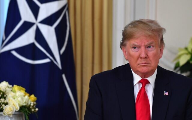US President Donald Trump during his meeting with NATO Secretary General Jens Stoltenberg at Winfield House, London, December 3, 2019. (Nicholas Kamm/AFP) US President Donald Trump during his meeting with NATO Secretary General Jens Stoltenberg at Winfield House, London, December 3, 2019. (Nicholas Kamm/AFP)