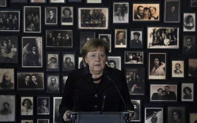German Chancellor Angela Merkel delivers a speech during her visit at the former German Nazi death camp Auschwitz-Birkenau in Oswiecim, Poland on December 6, 2019. (John Macdougall/AFP)