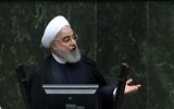 Iran's President Hassan Rouhani delivers a speech to present the budget for the financial year starting late March 2020 to the parliament in Tehran on December 8, 2019. (STR/AFP)