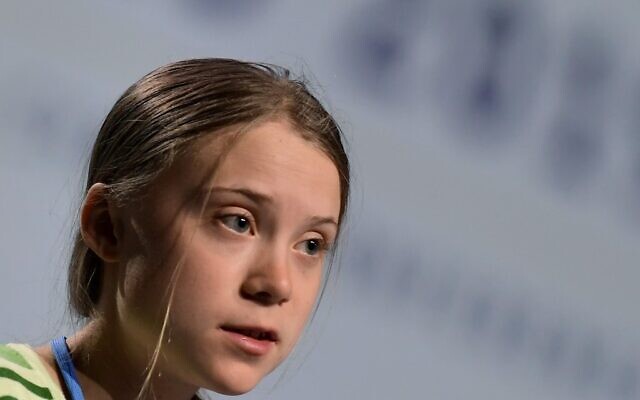 In this file photo taken on December 11, 2019, Swedish climate activist Greta Thunberg speaks during a high-level event on climate emergency hosted by the Chilean presidency during the UN Climate Change Conference COP25 in Madrid. (Photo by CRISTINA QUICLER / AFP) In this file photo taken on December 11, 2019, Swedish climate activist Greta Thunberg speaks during a high-level event on climate emergency hosted by the Chilean presidency during the UN Climate Change Conference COP25 in Madrid. (Photo by CRISTINA QUICLER / AFP)