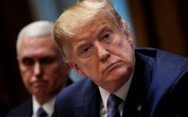 US Vice President Mike Pence and US President Donald Trump attend a meeting in the Cabinet Room of the White House December 16, 2019, in Washington, DC. (Photo by Brendan Smialowski / AFP) US Vice President Mike Pence and US President Donald Trump attend a meeting in the Cabinet Room of the White House December 16, 2019, in Washington, DC. (Photo by Brendan Smialowski / AFP)