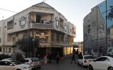 A picture taken on December 20, 2019, shows British artist Banksy's Walled-Off Hotel facing the security barrier in the West Bank town of Bethlehem. (Ahmad Gharabli/AFP)