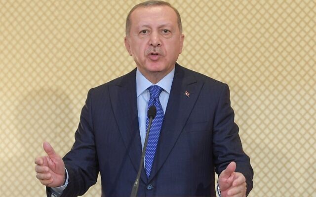 Turkish President Recep Tayyip Erdogan speaks during a joint press conference with his Tunisian counterpart at the presidential palace in Carthage, east of the capital Tunis, on December 25, 2019. (Photo by FETHI BELAID / AFP) Turkish President Recep Tayyip Erdogan speaks during a joint press conference with his Tunisian counterpart at the presidential palace in Carthage, east of the capital Tunis, on December 25, 2019. (Photo by FETHI BELAID / AFP)