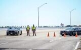 Florida state troopers block traffic over the Bayou Grande Bridge leading to the Pensacola Naval Air Station following a shooting on December 6, 2019, in Pensacola, Florida. (Josh Brasted/Getty Images/AFP)