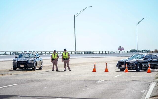 Florida state troopers block traffic over the Bayou Grande Bridge leading to the Pensacola Naval Air Station following a shooting on December 6, 2019, in Pensacola, Florida. (Josh Brasted/Getty Images/AFP) Florida state troopers block traffic over the Bayou Grande Bridge leading to the Pensacola Naval Air Station following a shooting on December 6, 2019, in Pensacola, Florida. (Josh Brasted/Getty Images/AFP)