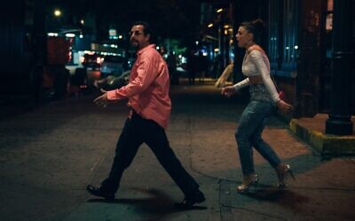 Adam Sandler as Howard Ratner and Julia Fox as Julia in 'Uncut Gems,' by Josh and Benny Safdie. (Courtesy)