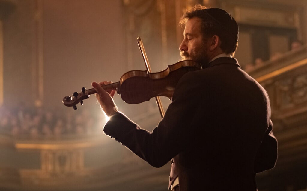 Clive Owen excels in the complex role of a man torn between his talent and the need to remember. (Sabrina Lantos/Sony Pictures Classics/via JTA) Clive Owen excels in the complex role of a man torn between his talent and the need to remember. (Sabrina Lantos/Sony Pictures Classics/via JTA)