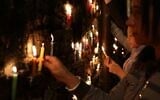Colombians celebrate Dia de las Velitas at the Cathedral-Basilica of the Immaculate Conception in Bogota, December 7, 2018. (Lokman Ilhan/Anadolu Agency/Getty Images/via JTA)