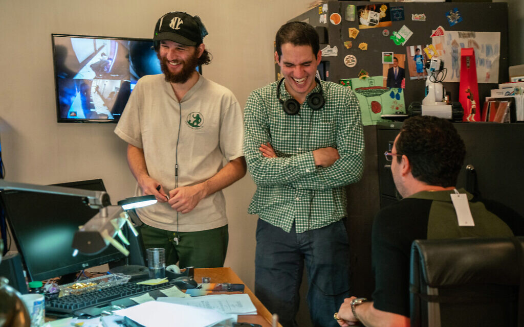 From left, Josh Safdie, Benny Safdie and Adam Sandler on the set of 'Uncut Gems.' (Wally McGrady/Courtesy of A24/via JTA)