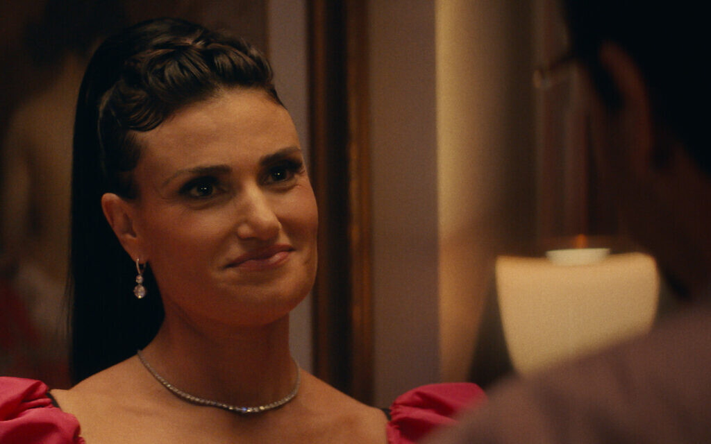 Idina Menzel in her character's old bat mitzvah dress in 'Uncut Gems.' (Courtesy of A24/via JTA)