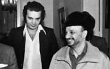 Terrorist Ali Hassan Salameh, left, is seen with then Palestine Liberation Organization leader Yasser Arafat in an undated photo (Courtesy)