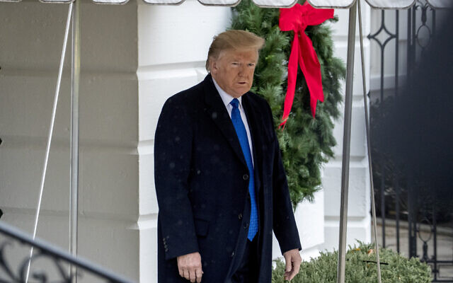 US President Donald Trump walks towards members of the media before boarding Marine One on the south Lawn of the White House in Washington, Monday, Dec. 2, 2019, for a short trip to Andrews Air Force Base, Md., and then on to London. (AP Photo/Andrew Harnik) US President Donald Trump walks towards members of the media before boarding Marine One on the south Lawn of the White House in Washington, Monday, Dec. 2, 2019, for a short trip to Andrews Air Force Base, Md., and then on to London. (AP Photo/Andrew Harnik)