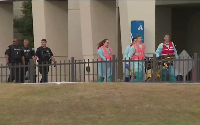 This photo taken from video provided by WEAR-TV shows emergency responders near the Naval Air Base Station in Pensacola, Fla., Friday, Dec. 6, 2019. (WEAR-TV via AP) This photo taken from video provided by WEAR-TV shows emergency responders near the Naval Air Base Station in Pensacola, Fla., Friday, Dec. 6, 2019. (WEAR-TV via AP)