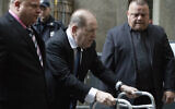 Harvey Weinstein, center, arrives for a court hearing, December 11, 2019, in New York. (AP Photo/Mark Lennihan)