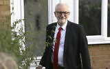 Labour Party leader Jeremy Corbyn leaves his home in Islington, north London, December 13, 2019, after defeat by Prime Minister Boris Johnson in Britain’s election. (Isabel Infantes/PA via AP)