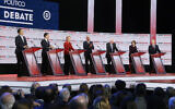 Democratic US presidential candidates from left, entrepreneur Andrew Yang, South Bend Mayor Pete Buttigieg, Sen. Elizabeth Warren, D-Mass., former Vice President Joe Biden, Sen. Bernie Sanders, I-Vt., Sen. Amy Klobuchar, D-Minn., and businessman Tom Steyer participate in a Democratic presidential primary debate December 19, 2019, in Los Angeles. (AP/Chris Carlson)