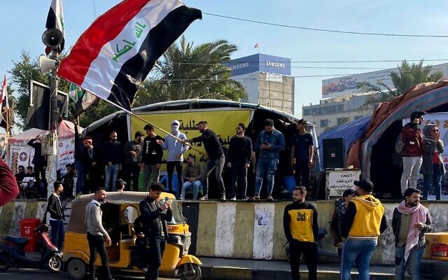 Anti-government protesters gather in Tahrir Square in Baghdad, Iraq, December 22, 2019. (AP Photo/Khalid Mohammed) Anti-government protesters gather in Tahrir Square in Baghdad, Iraq, December 22, 2019. (AP Photo/Khalid Mohammed)
