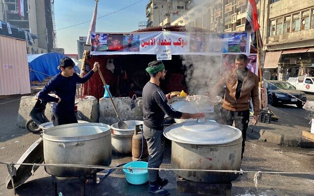 Volunteers prepare free food for anti-government protesters in Baghdad, Iraq, December 22, 2019. (AP Photo/Khalid Mohammed) Volunteers prepare free food for anti-government protesters in Baghdad, Iraq, December 22, 2019. (AP Photo/Khalid Mohammed)