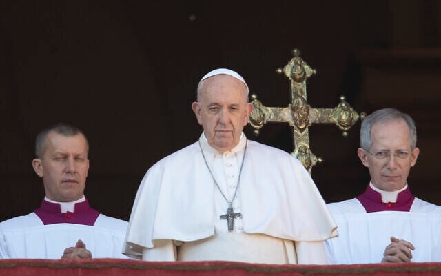 Pope Francis looks at the crowd after he delivered the Urbi et Orbi (Latin for 'to the city and to the world' ) Christmas' day blessing from the main balcony of St. Peter's Basilica at the Vatican, December 25, 2019. (Alessandra Tarantino/AP) Pope Francis looks at the crowd after he delivered the Urbi et Orbi (Latin for 'to the city and to the world' ) Christmas' day blessing from the main balcony of St. Peter's Basilica at the Vatican, December 25, 2019. (Alessandra Tarantino/AP)