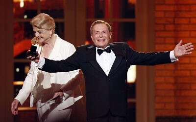 In this June 7, 2009, file photo, Jerry Herman accepts his Special Tony Award for Lifetime Achievement in the Theater from Angela Lansbury at the 63rd Annual Tony Awards in New York. (AP Photo/Seth Wenig, FILE)