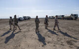 Army commanders tour the operations sectors of the Iraqi army Seventh Brigade, at the start of the eighth phase of the operation, in Anbar, Iraq, Sunday, Dec. 29, 2019. (AP Photo/Nasser Nasser)