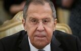 Russian Foreign Minister Sergey Lavrov listens to Iranian Foreign Minister Mohammad Javad Zarif during their talks in Moscow, Russia, December 30, 2019. (AP Photo/Alexander Zemlianichenko)