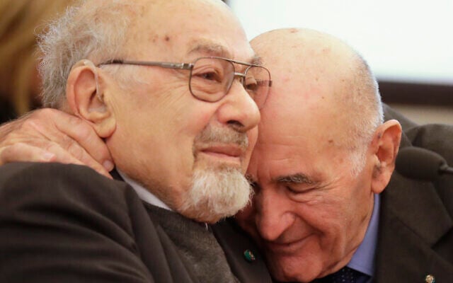 Holocaust survivors Sami Modiano, right and Piero Terracina hug each other during an event to commemorate the International Holocaust Remembrance Day, in the Rome's Capitol Hill, Friday, Jan. 27, 2017. (AP Photo/Alessandra Tarantino) Holocaust survivors Sami Modiano, right and Piero Terracina hug each other during an event to commemorate the International Holocaust Remembrance Day, in the Rome's Capitol Hill, Friday, Jan. 27, 2017. (AP Photo/Alessandra Tarantino)