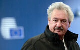 Luxembourg's Foreign Minister Jean Asselborn arrives for a meeting of EU foreign ministers at the Europa building in Brussels on Monday, Feb. 26, 2018. European Union foreign ministers meet in Brussels on Monday Feb. 26 to debate ways to revive Middle East peace efforts and discuss the crisis in Venezuela. (AP Photo/Virginia Mayo)