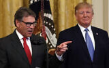 President Donald Trump listens as Energy Secretary Rick Perry speaks during an event about the environment in the East Room of the White House, Monday, July 8, 2019, in Washington. (AP Photo/Alex Brandon)