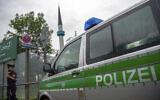 Illustrative: A police van in Munich, Germany on July 11, 2019. (Lino Mirgeler/dpa via AP)