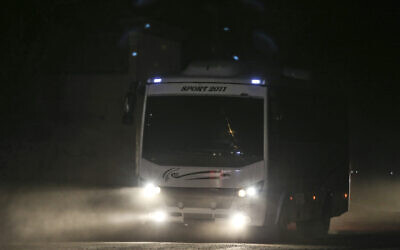 Illustrative: Turkish police and army cars escort vans and buses returning from Syria, reportedly carrying Islamic State group members and their families, at the border town of Akcakale, Sanliurfa province, southeastern Turkey, October 18, 2019. (Emrah Gurel/AP)