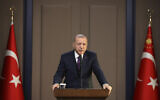 Turkey's President Recep Tayyip Erdogan speaks before departing to attend a NATO leader's summit in London, in Ankara, Turkey, December 3, 2019. (Presidential Press Service via AP, Pool)