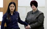 Malka Leifer, right, is brought to a courtroom in Jerusalem, on February 27, 2018. (AP Photo/Mahmoud Illean, File)