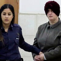 Malka Leifer, right, is brought to a courtroom in Jerusalem, on February 27, 2018. (AP Photo/Mahmoud Illean, File)