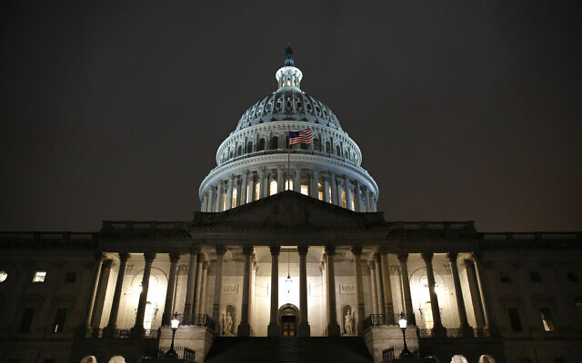 Lights shine on the U.S. Capitol dome, Monday, Dec. 9, 2019, after the House Judiciary Committee heard investigative findings in the impeachment inquiry of US President Donald Trump on Capitol Hill in Washington. (AP Photo/Patrick Semansky) Lights shine on the U.S. Capitol dome, Monday, Dec. 9, 2019, after the House Judiciary Committee heard investigative findings in the impeachment inquiry of US President Donald Trump on Capitol Hill in Washington. (AP Photo/Patrick Semansky)