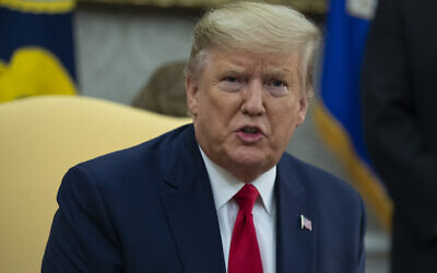 US President Donald Trump speaks in the Oval Office of the White House, in Washington, December 17, 2019. (Evan Vucci/AP)
