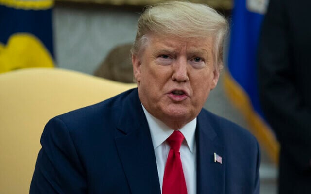 US President Donald Trump speaks in the Oval Office of the White House, in Washington, December 17, 2019. (Evan Vucci/AP) US President Donald Trump speaks in the Oval Office of the White House, in Washington, December 17, 2019. (Evan Vucci/AP)