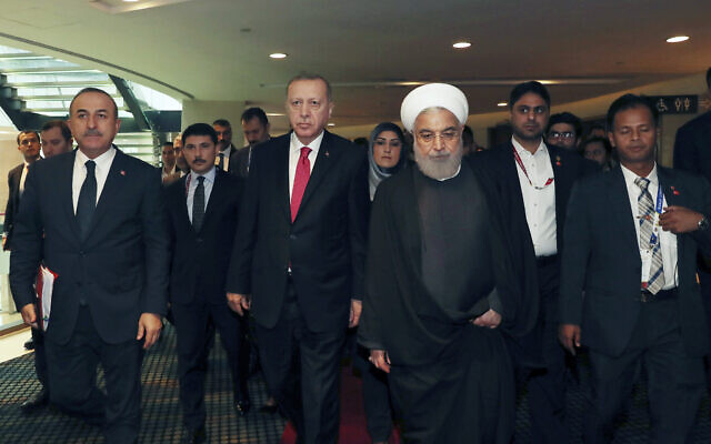 Turkey's President Recep Tayyip Erdogan center left, walks with Iran's President Hassan Rouhani, centre right, following their meeting at the sidelines of the Kuala Lumpur Summit in Kuala Lumpur, Malaysia on December 19, 2019. (Presidential Press Service via AP, Pool) Turkey's President Recep Tayyip Erdogan center left, walks with Iran's President Hassan Rouhani, centre right, following their meeting at the sidelines of the Kuala Lumpur Summit in Kuala Lumpur, Malaysia on December 19, 2019. (Presidential Press Service via AP, Pool)