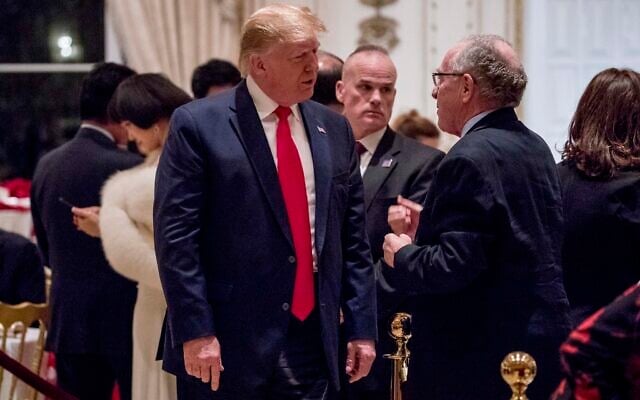 President Donald Trump speaks to attorney Alan Dershowitz, right, as he arrives for Christmas Eve dinner at Mar-a-lago in Palm Beach, Fla., Tuesday, December 24, 2019. (AP Photo/Andrew Harnik) President Donald Trump speaks to attorney Alan Dershowitz, right, as he arrives for Christmas Eve dinner at Mar-a-lago in Palm Beach, Fla., Tuesday, December 24, 2019. (AP Photo/Andrew Harnik)