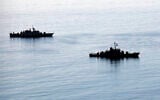 Illustrative: Two Iranian warships approach Iran's southeastern port city of Chahbahar, in the Gulf of Oman, December 27, 2019. (Iranian Army via AP)