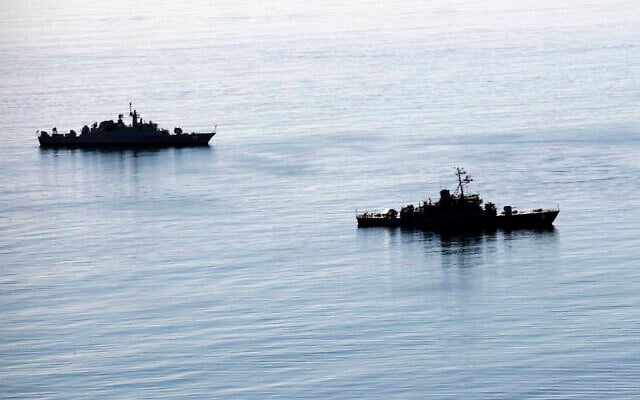 Illustrative: Two Iranian warships approach Iran's southeastern port city of Chahbahar, in the Gulf of Oman, December 27, 2019. (Iranian Army via AP) Illustrative: Two Iranian warships approach Iran's southeastern port city of Chahbahar, in the Gulf of Oman, December 27, 2019. (Iranian Army via AP)
